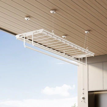 Hand winch ceiling clothes drying rack installed on wooden ceiling, suitable for natural balcony interiors.