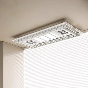 EaseRack Pro rack installed near bay window in bedroom, compact drying solution for limited space.