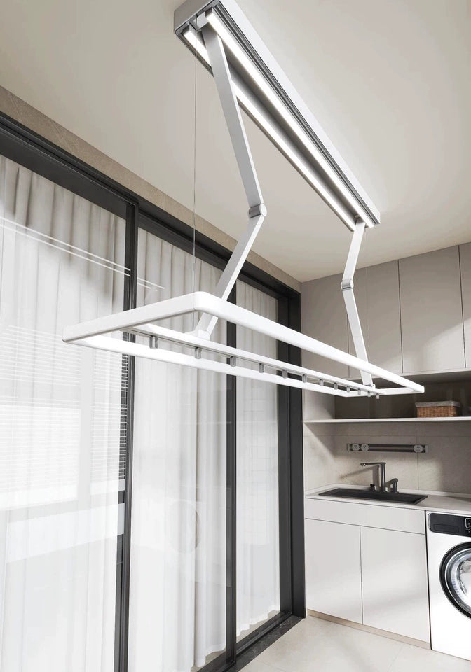 EaseRack X9 Mini electric clothes drying rack fully extended, showing adjustable arms and bar system.