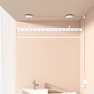 Side-mounted ceiling clothes rack on balcony for efficient space-saving laundry drying.