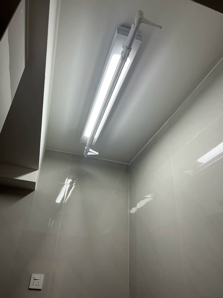 Easerack M2 Mini Clothes Airer folded neatly on ceiling, space-saving design