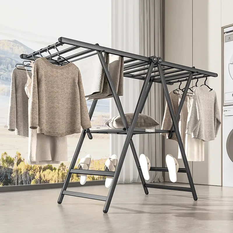 modern portable folding clothes drying rack in home