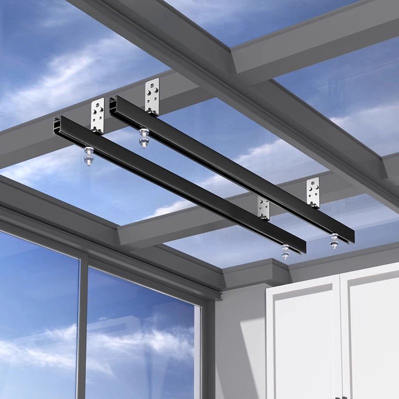 Ceiling-mounted electric clothes drying rack brackets for sunroom installation.