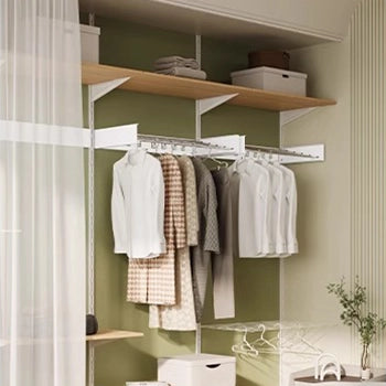 EaseRack wall mounted clothes airer used in open wardrobe space for organized laundry drying.