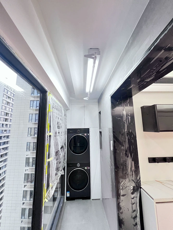 EaseRack M2 Mini Clothes Airer installed on balcony, compact and efficient indoor drying