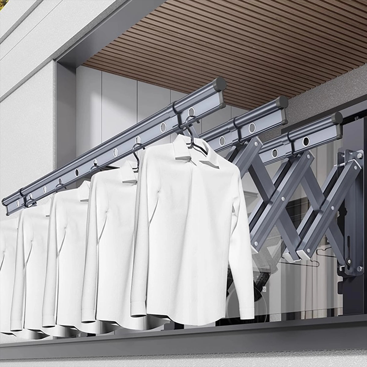 EaseRack wall-mounted retractable drying rack with shirts installed on a covered balcony.