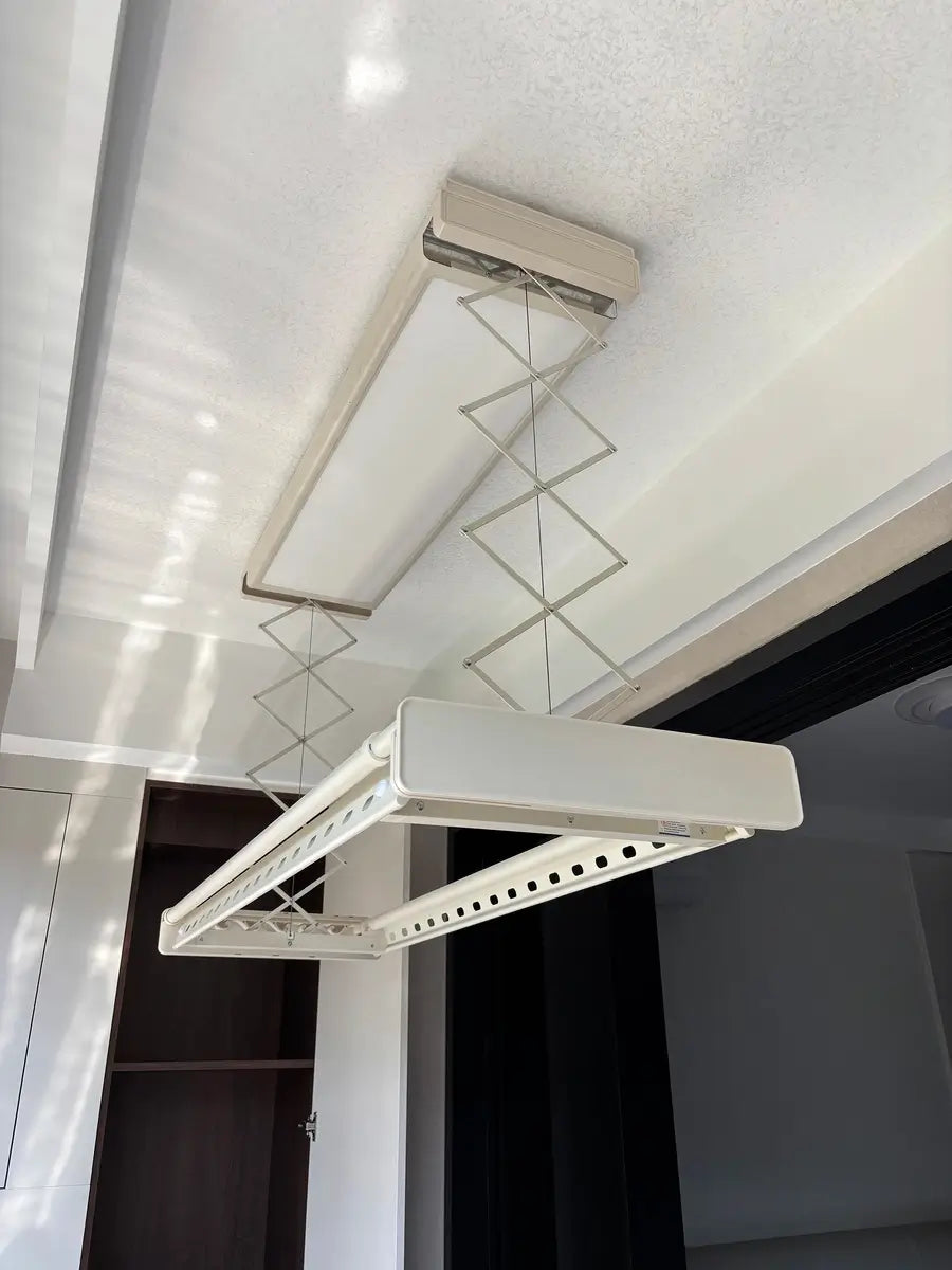 Retractable Easerack ceiling drying rack with scissor lift design for smart indoor drying.