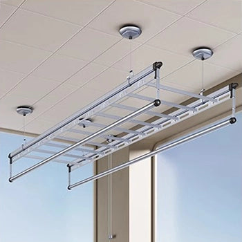 Manual crank ceiling clothes drying rack compatible with integrated ceiling design on modern balcony.