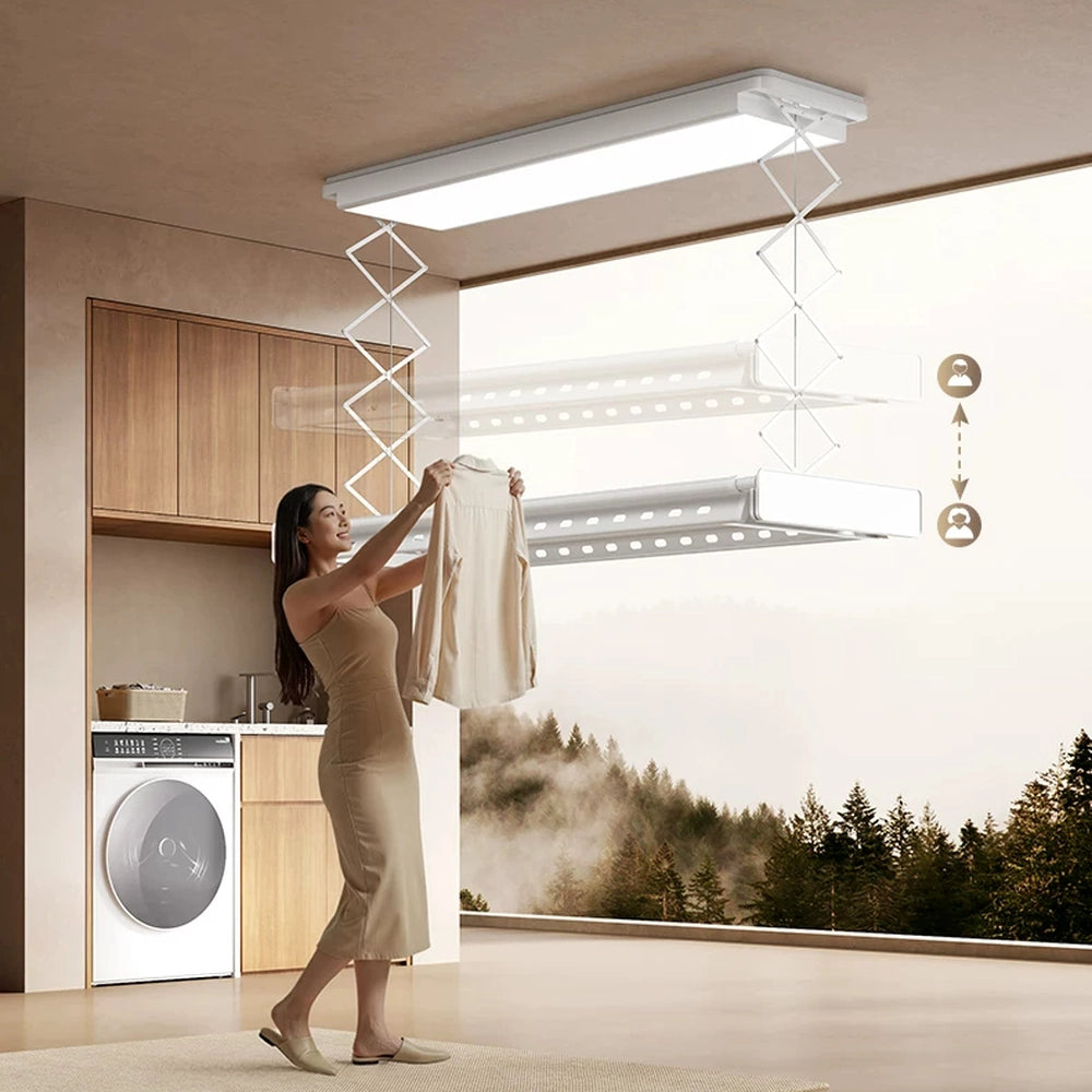 EaseRack V8 electric ceiling clothes airer lowered to a comfortable working height for loading laundry